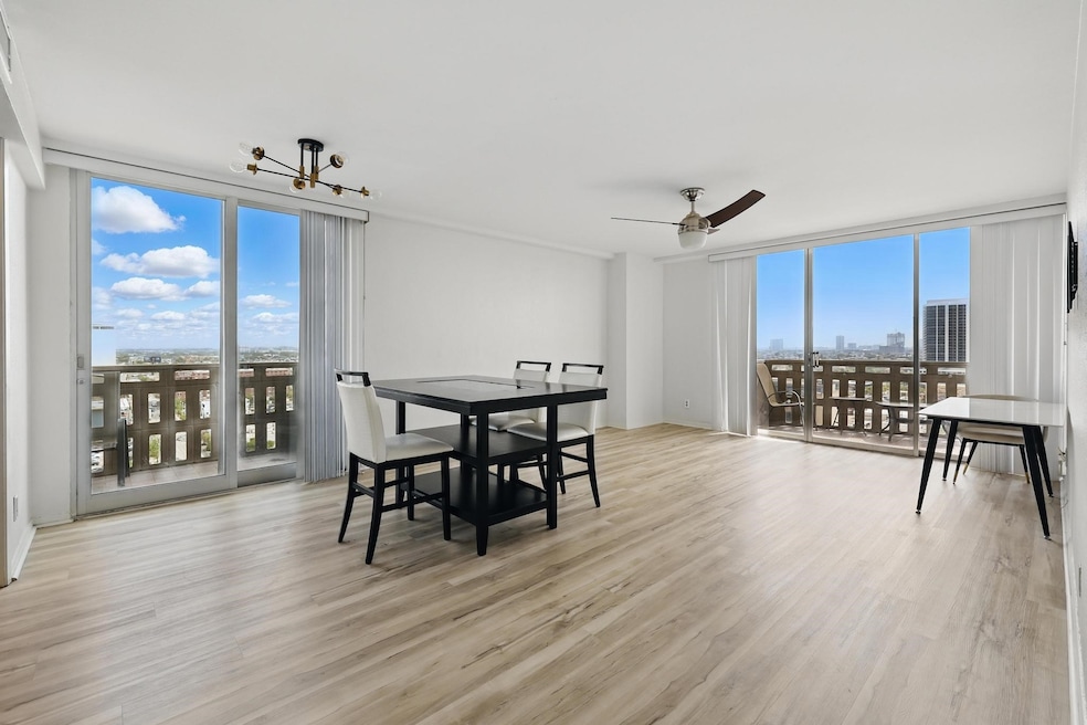 Flooded with natural light and skyline views, this