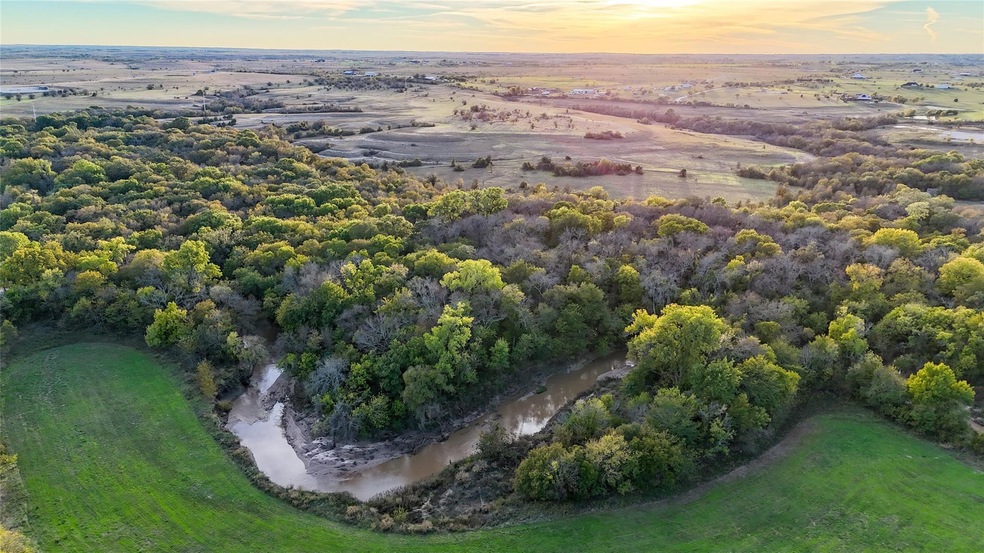 Aerial view at dusk with a water view