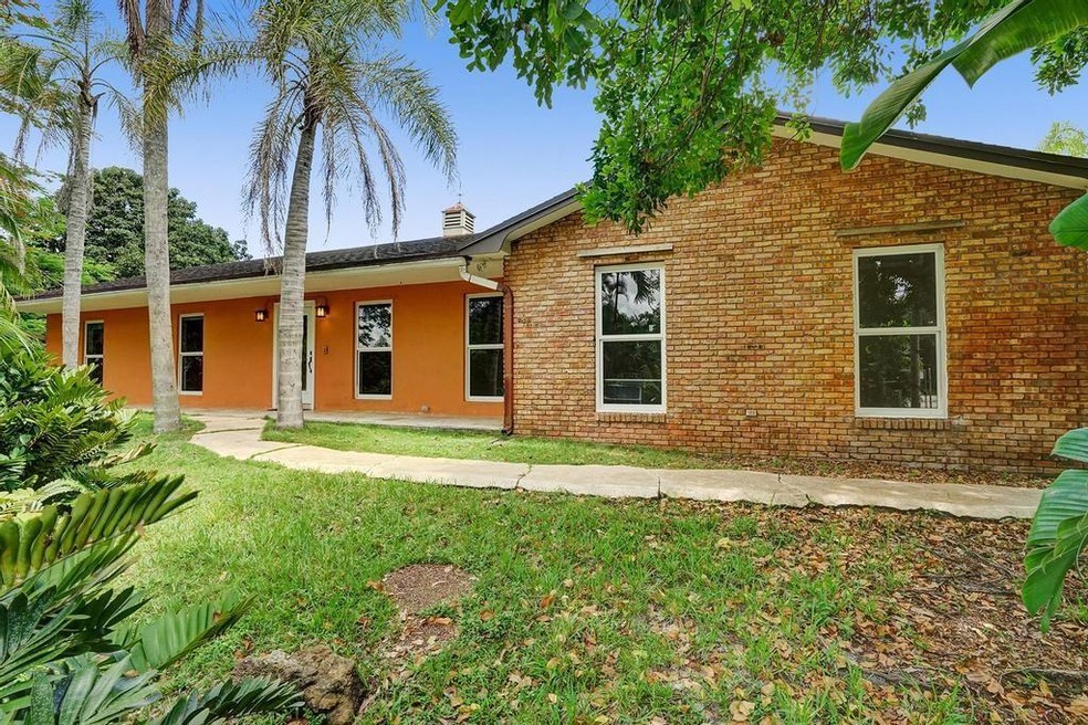 Front view of the home. Impact windows and doors.