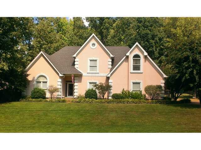 Large .40 acre cove lot with beautiful landscaping