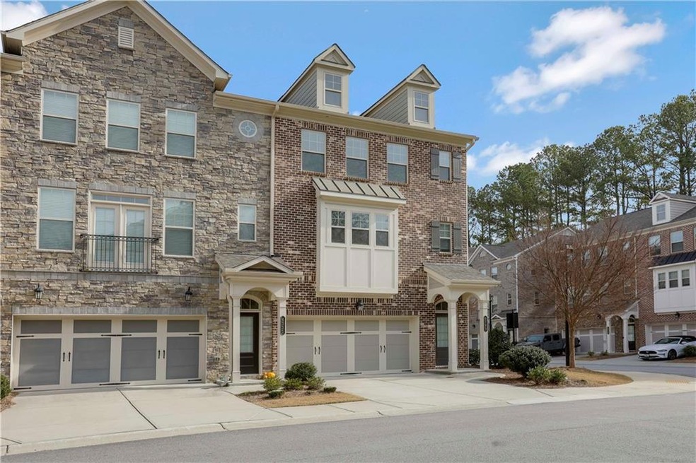 View of property featuring a garage