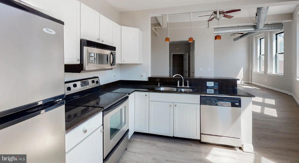 330 N Charles St unit 2B, Baltimore, MD 21201 - photo 1