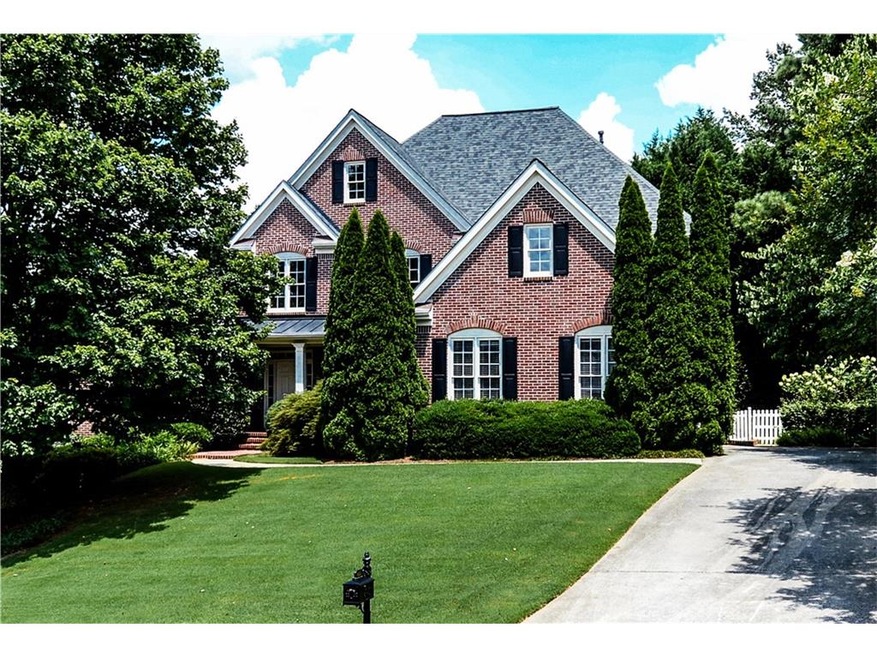 Beautiful all brick traditional with 3 car garage