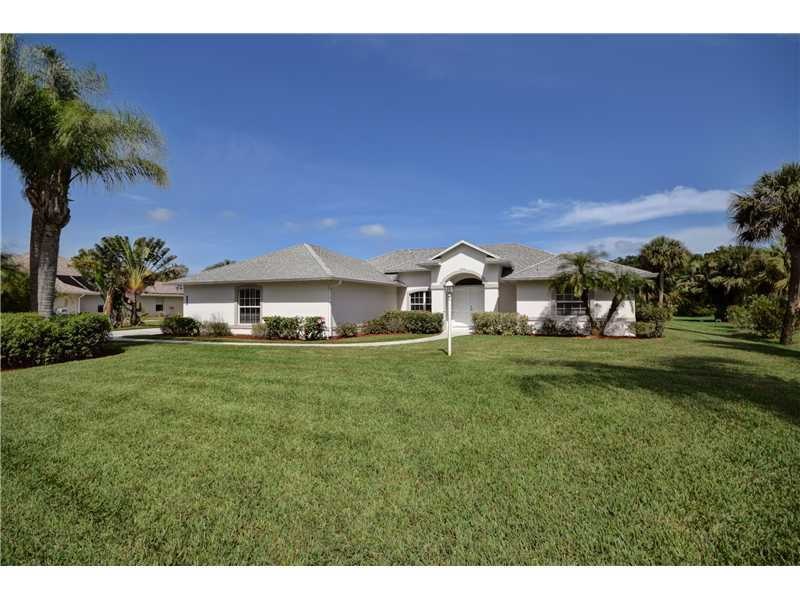 Exterior Front. .69 Acre Canal Lot