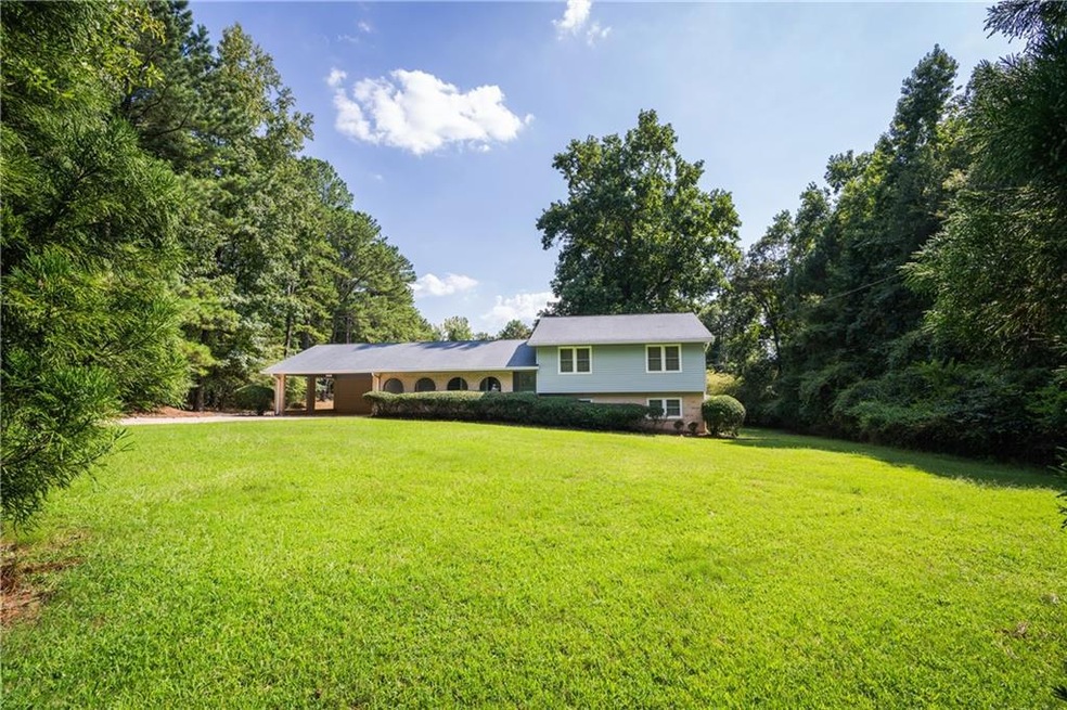 View of front of property with a front lawn