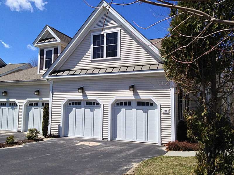 Exterior Front. 2 CAR GARAGE, PAVED DRIVE, COVERED