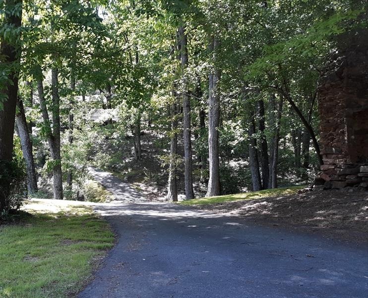4880 Wigley Road- Believe me there is a house tuck