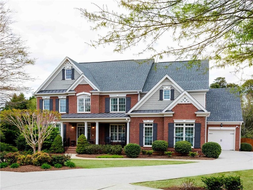 Front with level yard and driveway
