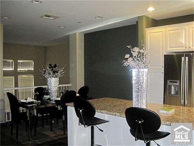 View of Dining area and kitchen Island with Granit