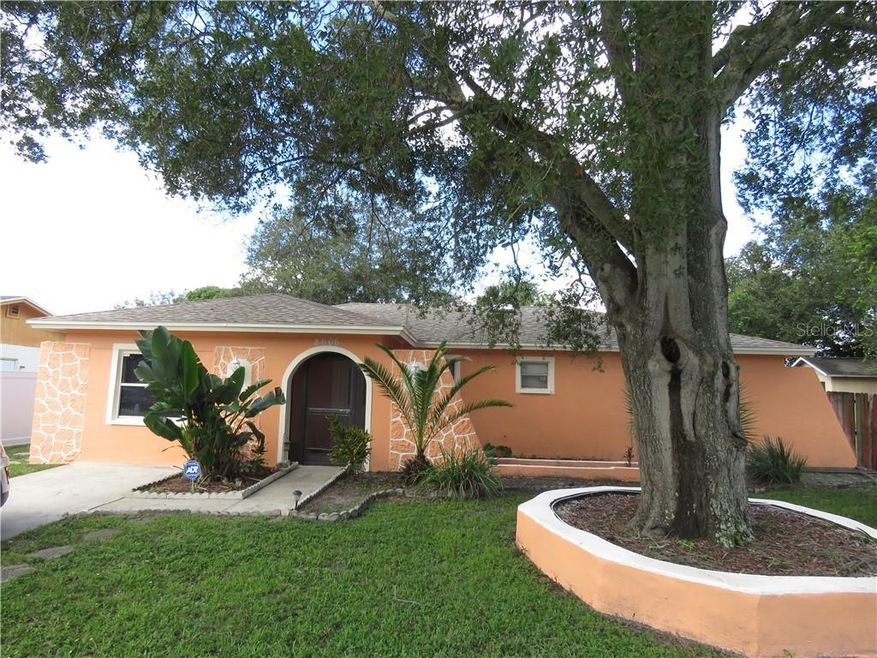 8606 Wood Ridge Rd, Tampa, FL 33619 - photo 1
