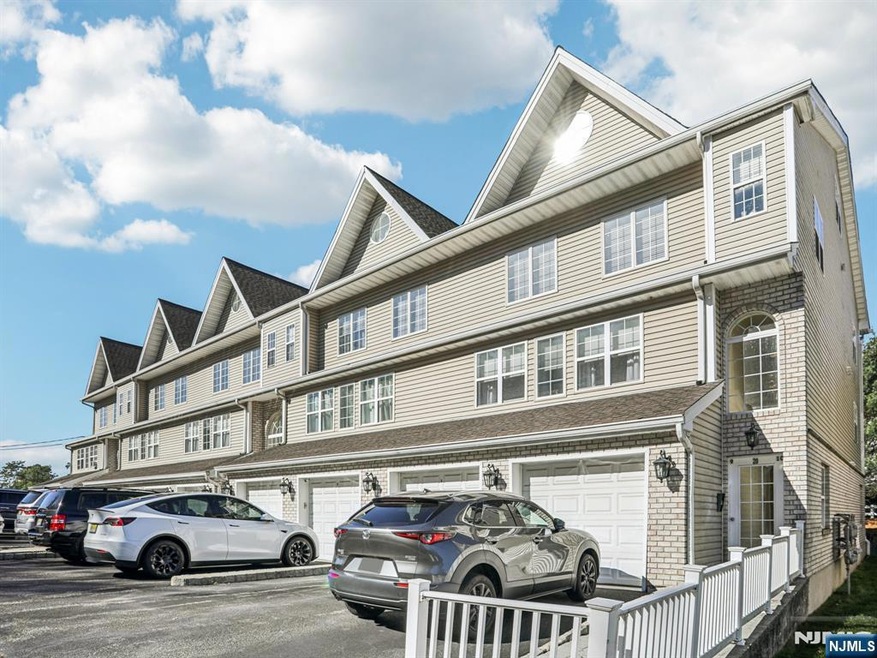 Includes a 1-car garage with extra storage and a dedicated driveway.