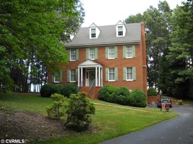 Exterior Front - Custom Built Home on Landscaped P