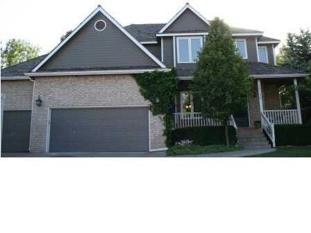 Front of home with big, beautiful front porch, lar