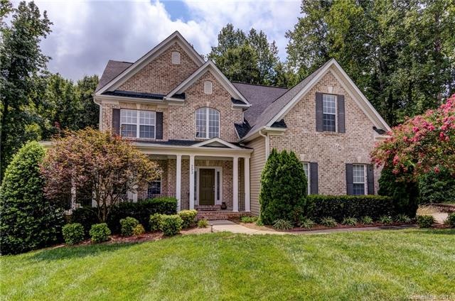 Custom-built home on private 1/2 acre lot in great