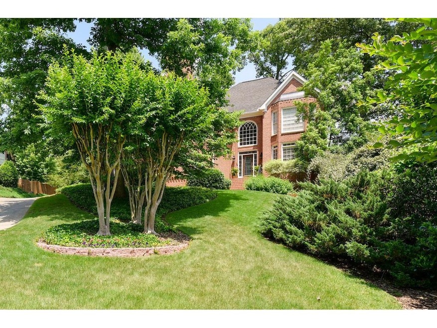 GORGEOUS BRICK HOME IN PRIVATE NATURAL SETTING