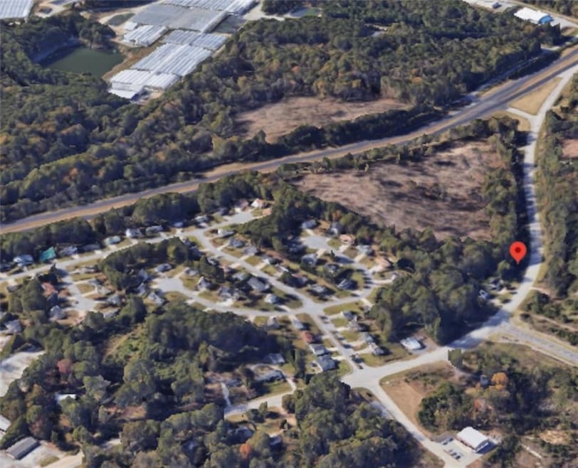 Aerial view of property and surrounding area