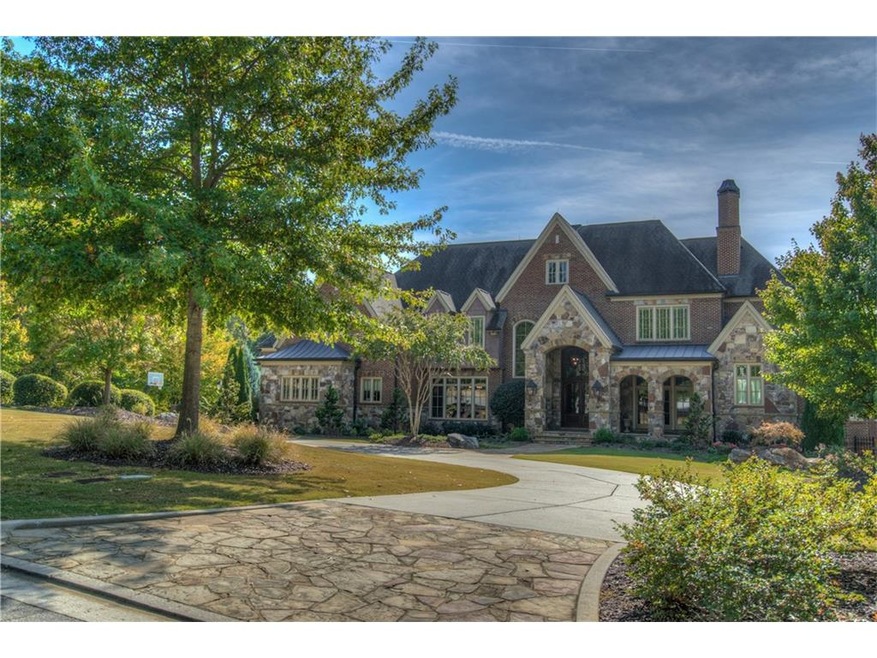 Gorgeous brick and stone estate on 1.42 acres!