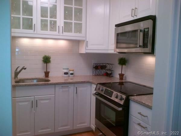 5 Bishop Rd unit 105, West Hartford, CT 06119 - photo 1