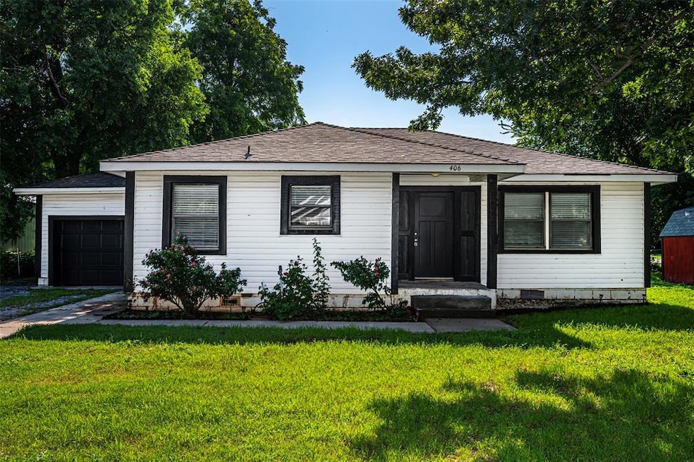 Bungalow-style home featuring crawl space, a front lawn, an attached garage, and a shingled roof