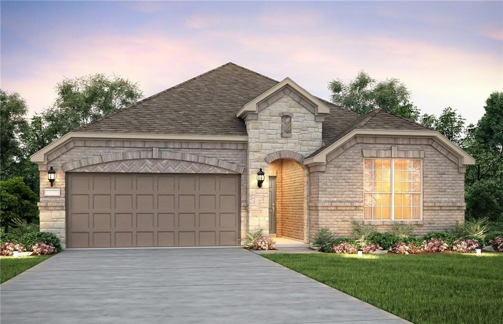 NEW CONSTRUCTION: Front of home with brick and sto