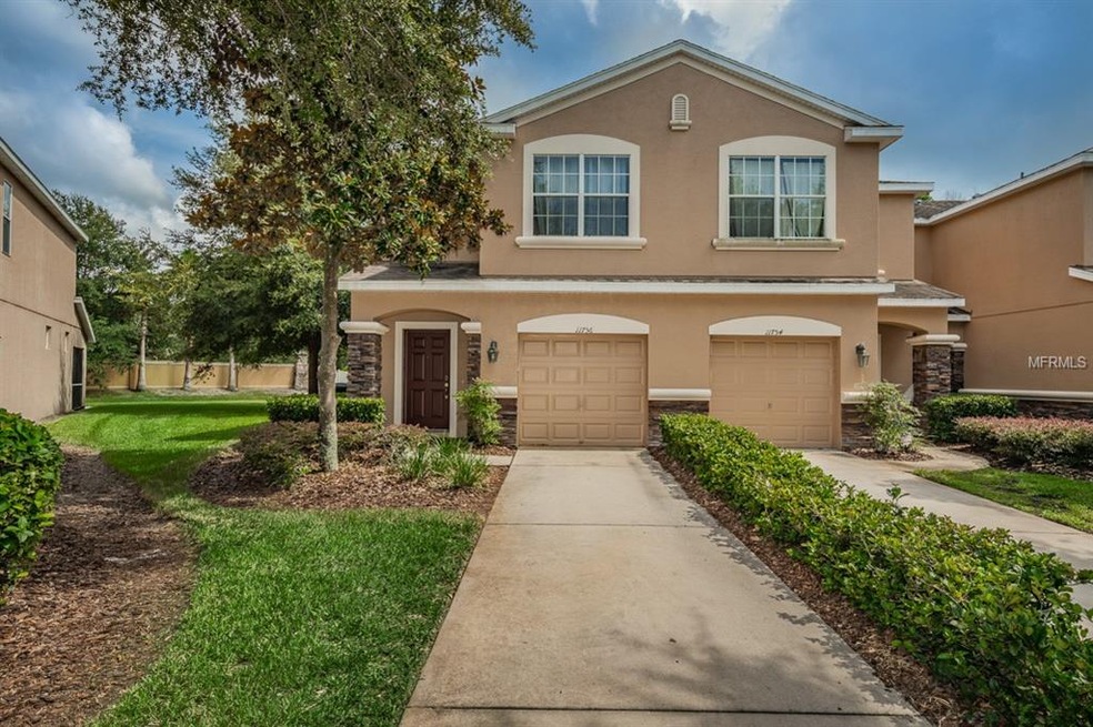 Corner unit with oversize lot and no rear neighbor