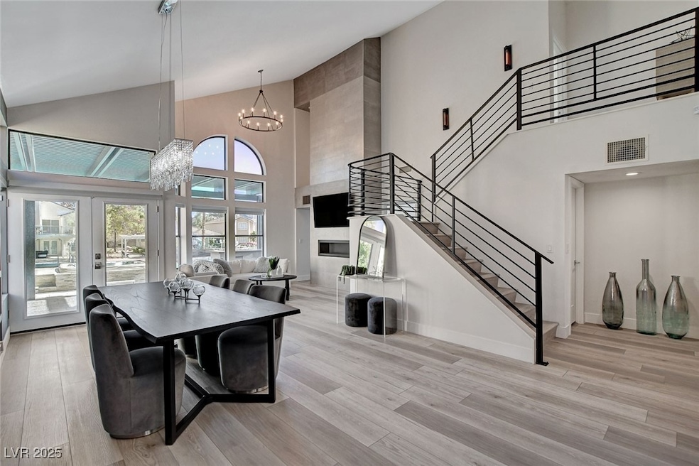 Dining space featuring stairs, light wood finished