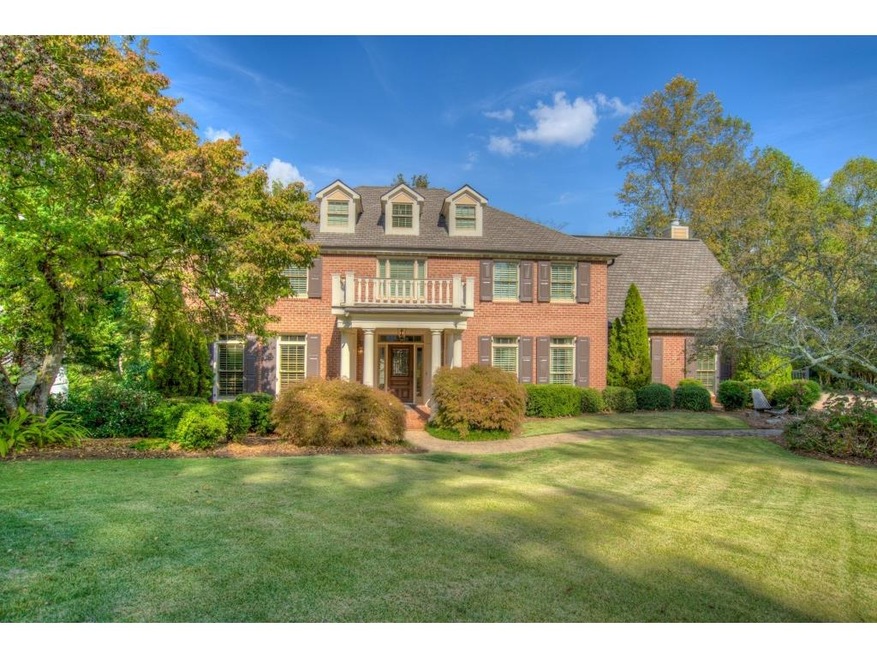 Lovely curb appeal with professional landscaping a