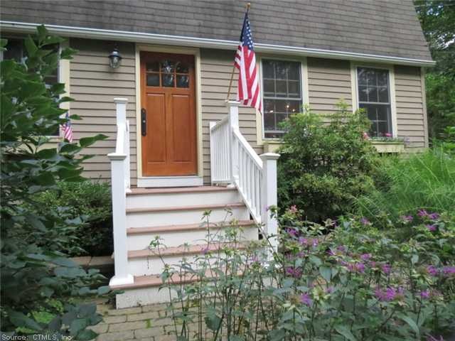Exterior Front. Solid Mahogany door