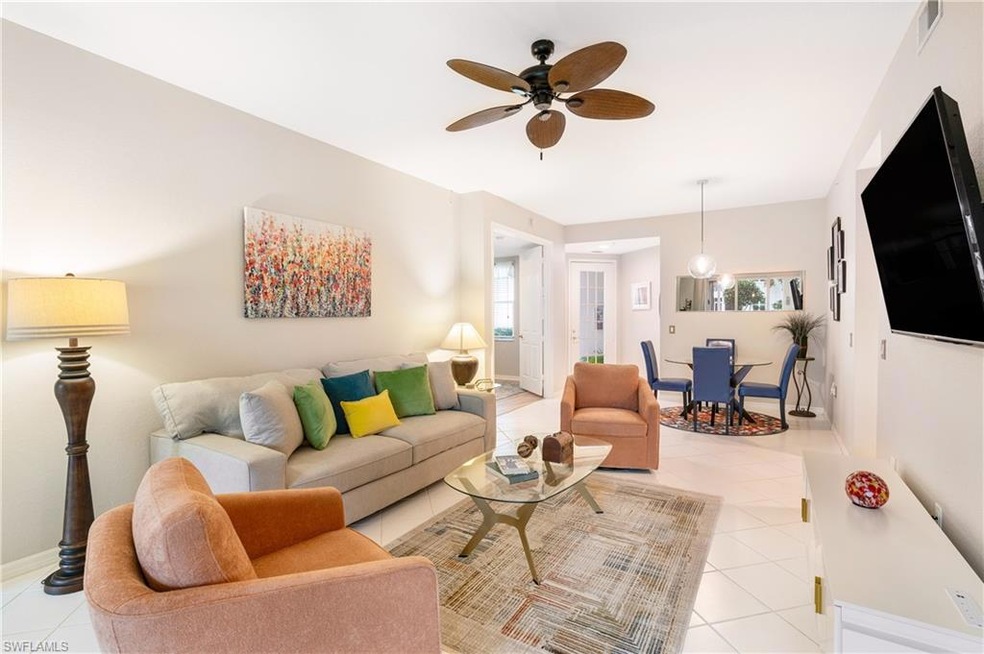 Living room featuring light tile patterned floors 