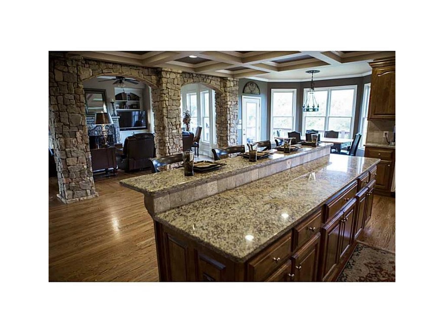 Kitchen. View from kitchen into breakfast area and