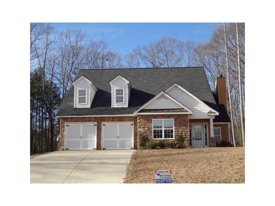Exterior Front. Wow! Hardiplank and stone accented