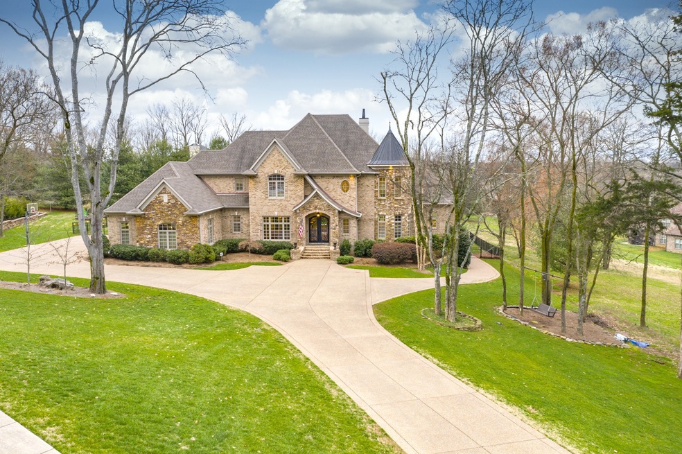 This fabulous custom home is situated on almost an acre lot and boasts of every custom amenity available! 