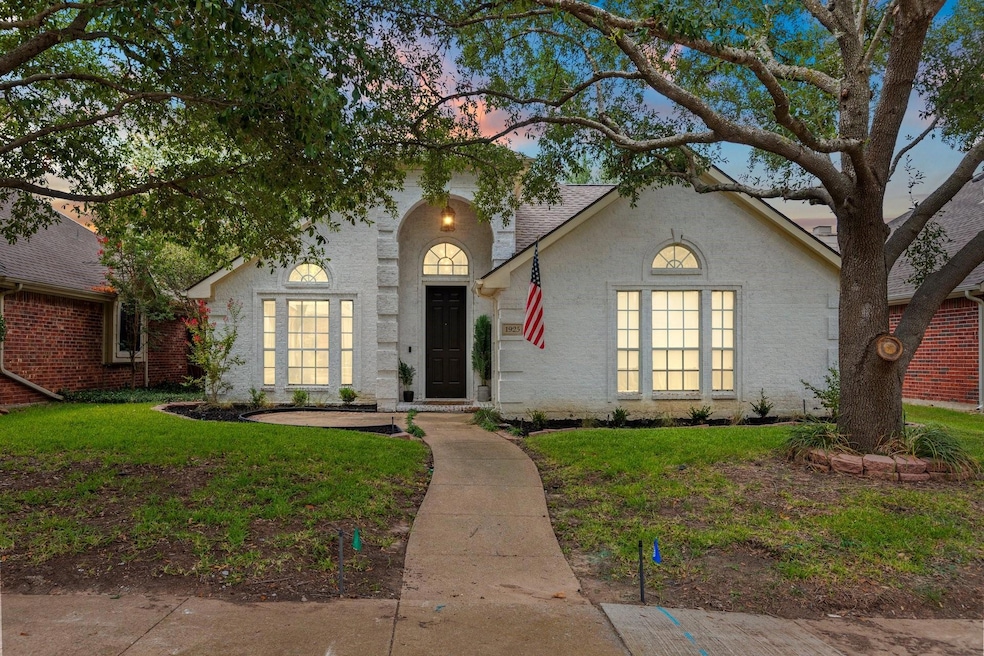 View of front of house with a lawn