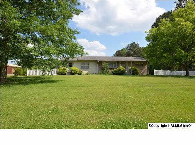 Front exterior with pecan tree on the right