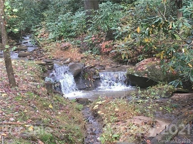 Build your cabin creekside on this peaceful lot!