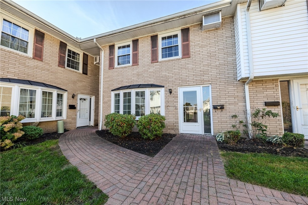 Property entrance with brick siding