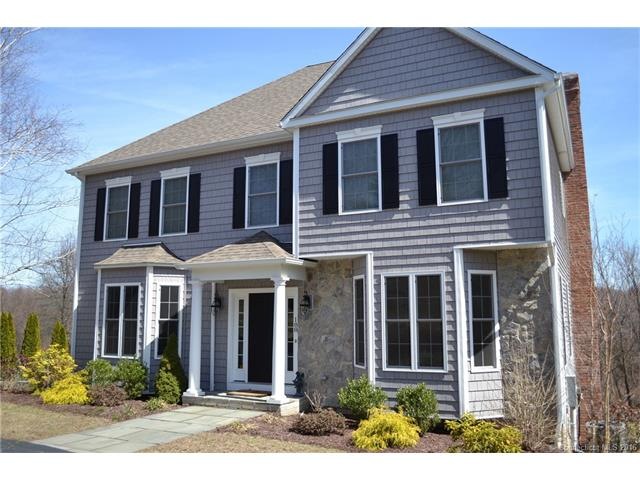 exterior front- Stone Veneer and upgraded shingle