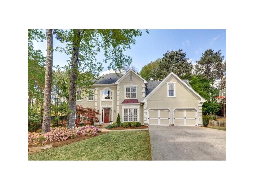 Great curb appeal in this updated home on large cu