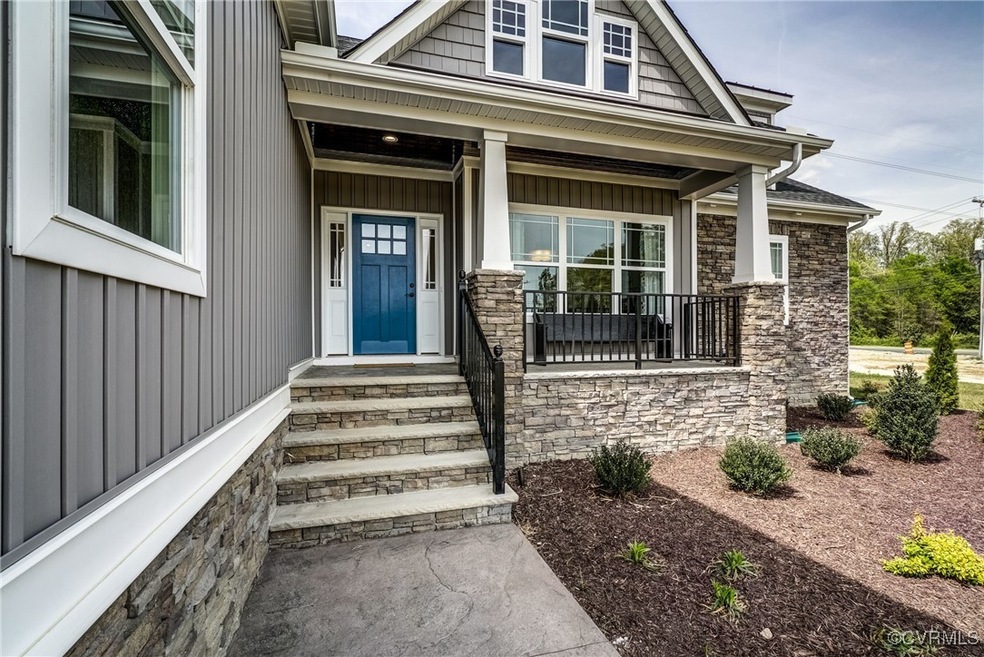 Property entrance with board and batten siding, st
