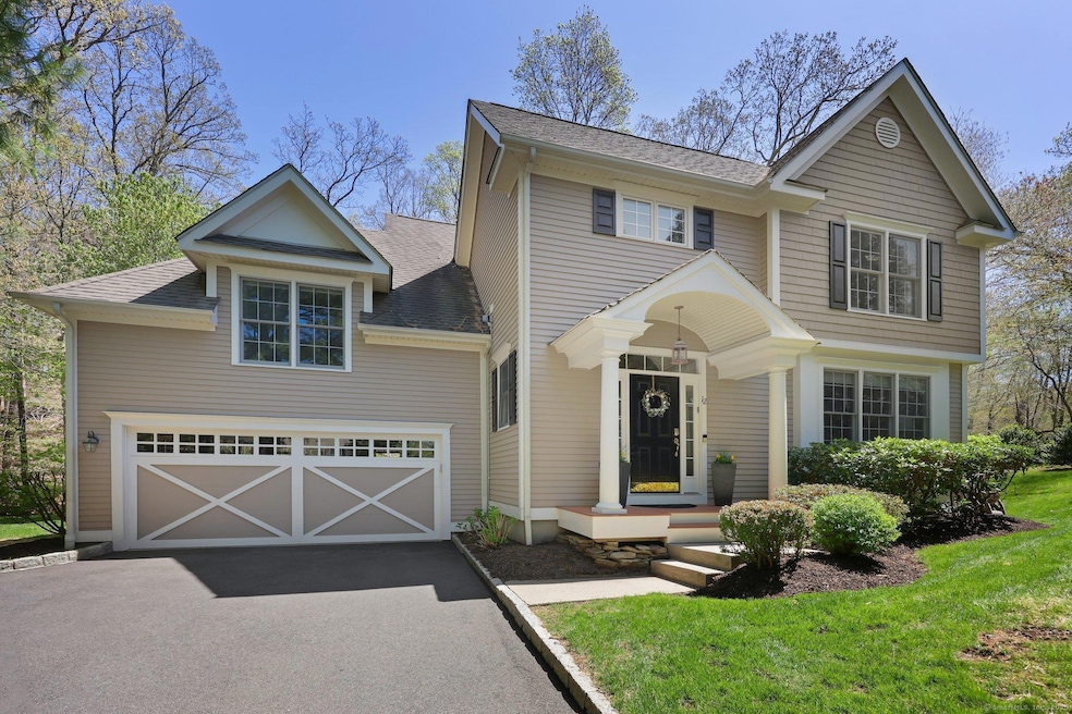 Front view of home with 2 car-attached garage