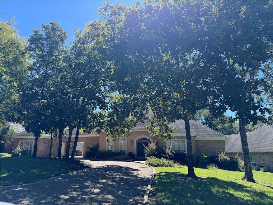 Single story home featuring a front lawn