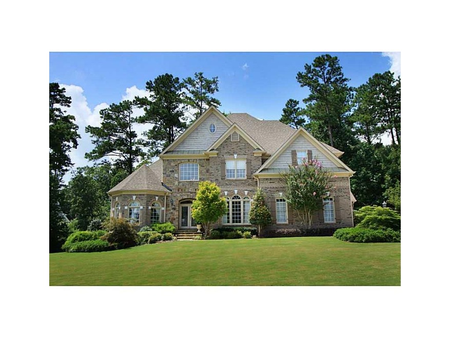 Exterior Front. Gorgeous traditional on 1.25 Acres