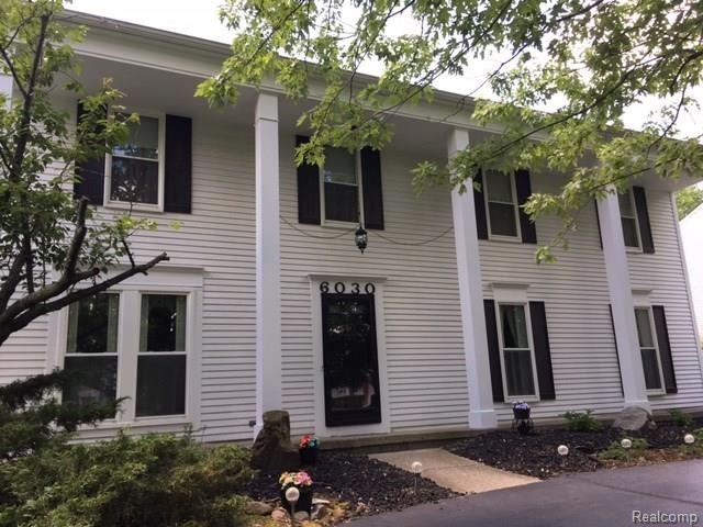 Stately Columns and covered front porch