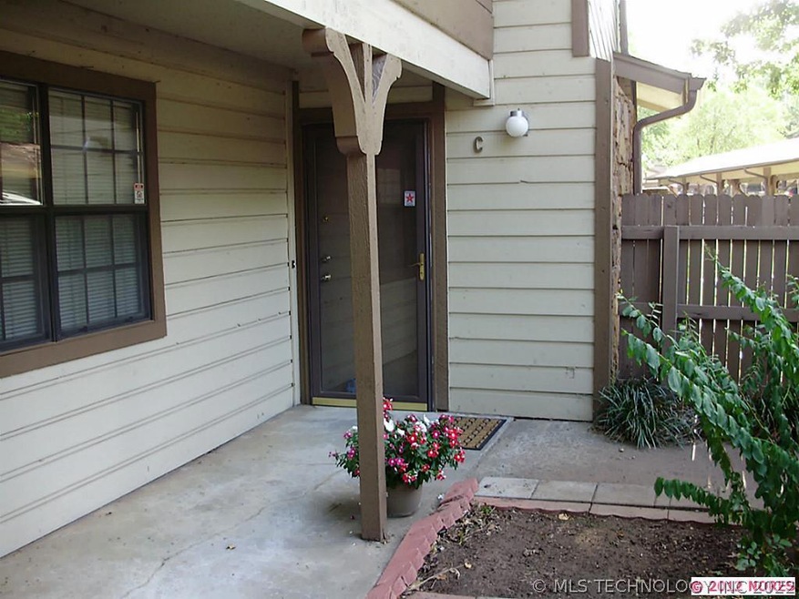 The covered porch extends almost the entire width