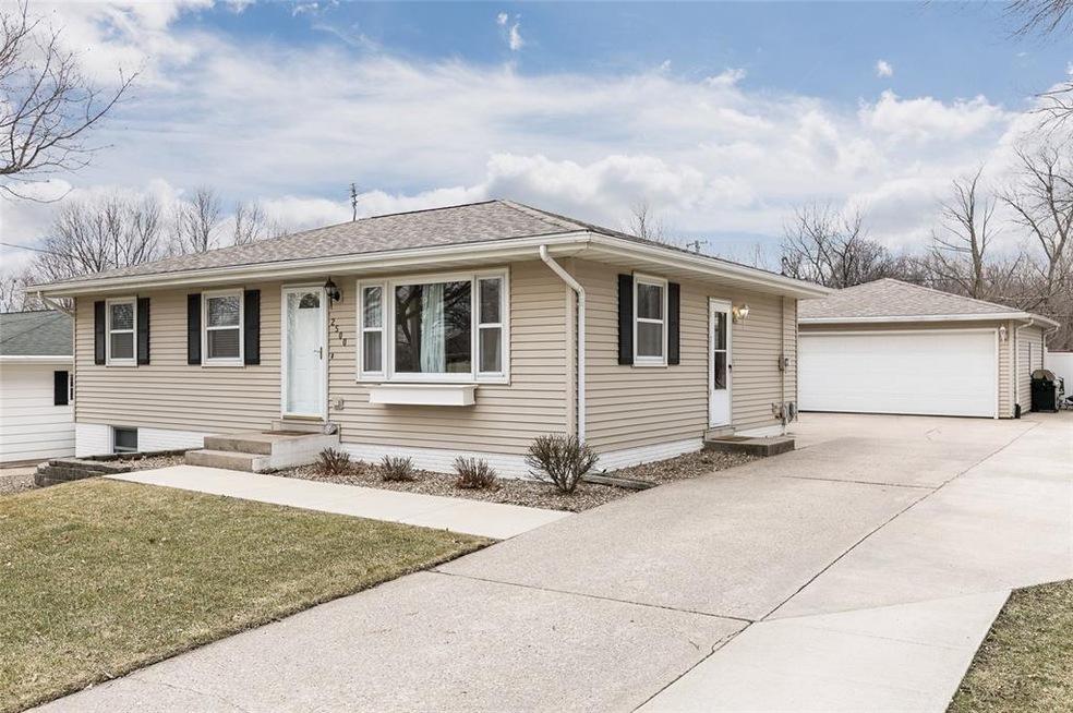 CONCRETE DRIVEWAY, VINYL SIDING