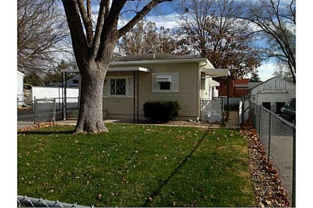 Exterior Front. Completely Fenced Yard