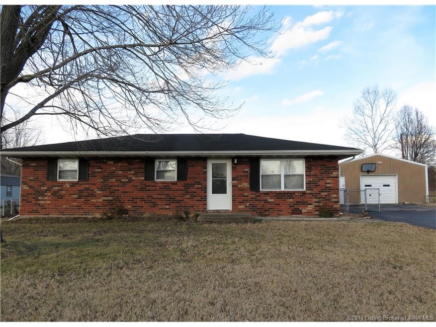 Updated brick ranch with great pole barn on approx
