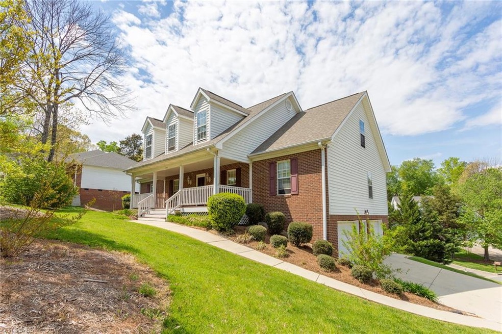 Perched on a corner, cul-de-sac lot, this home offers large garage, covered front porch and brick with vinyl exterior.  Roof 2 years!  AC and water heater replaced in 2019!