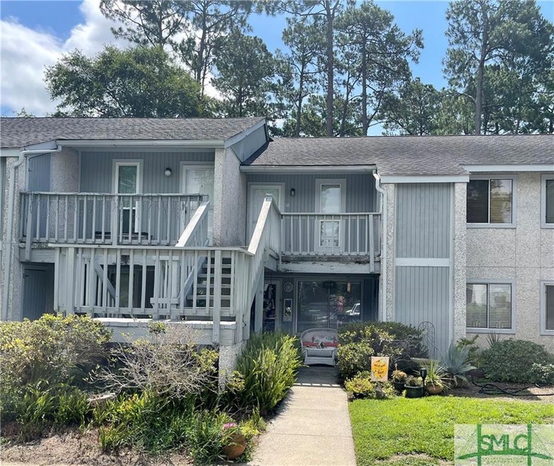 Lower level with covered front porch.