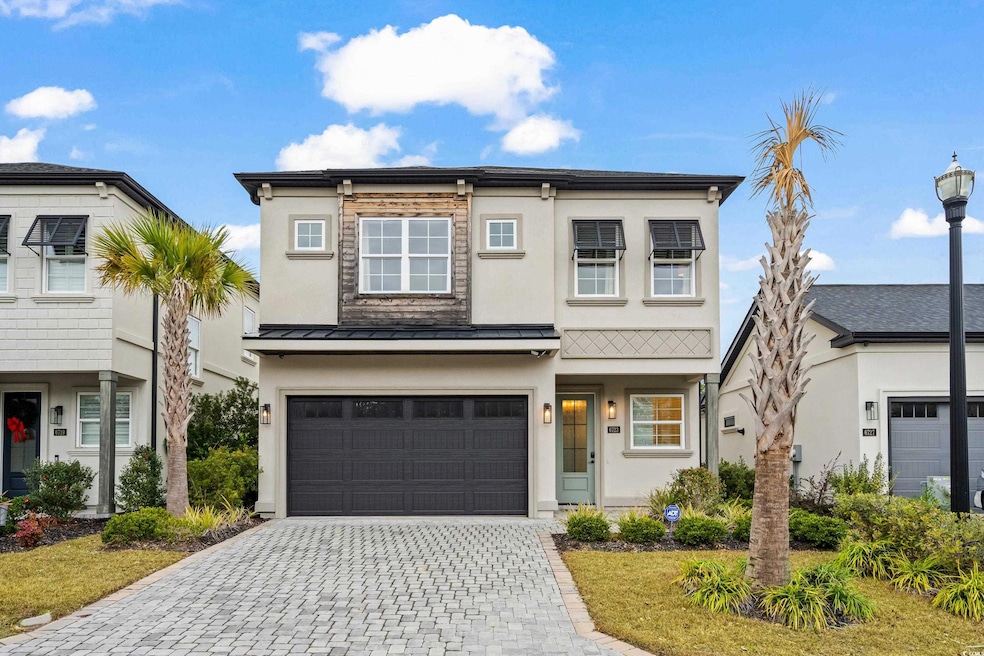 View of front facade with a garage